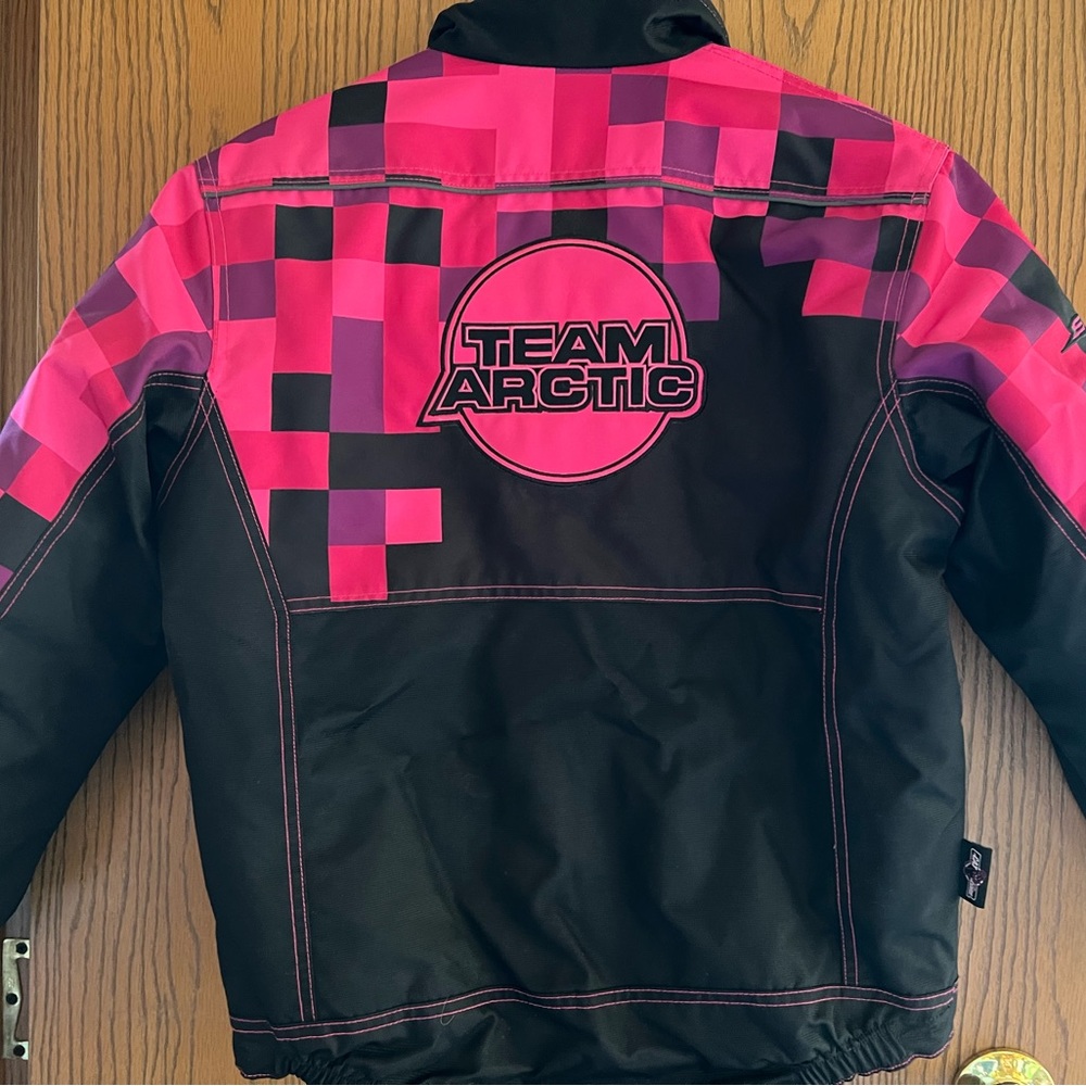 Barely used youth Team Arctic snowmobile jacket, size c10.